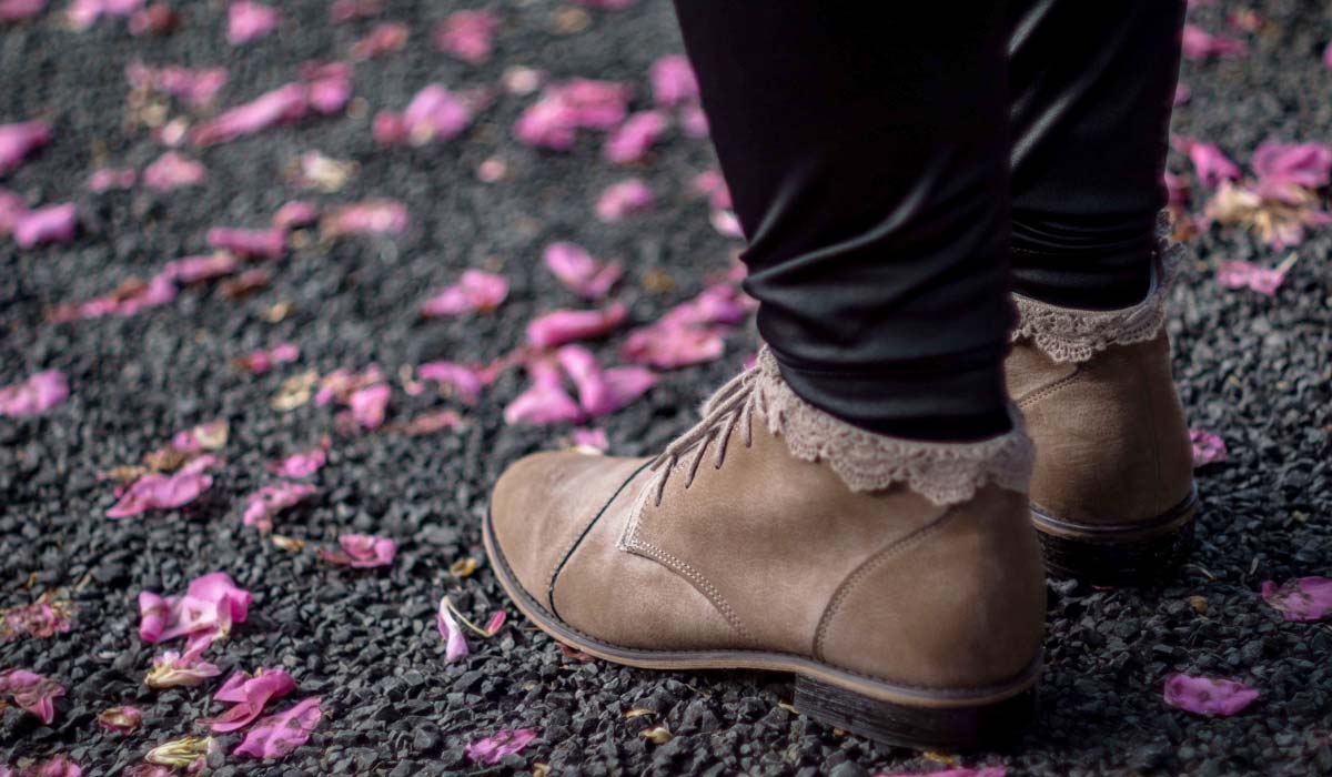 feet with flower petals