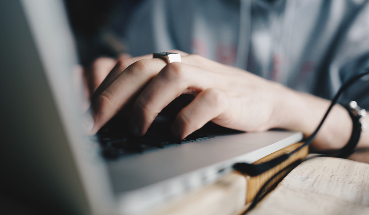 typing on laptop