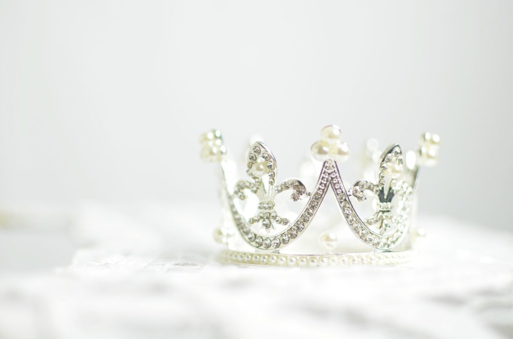 a crown on a white backdrop