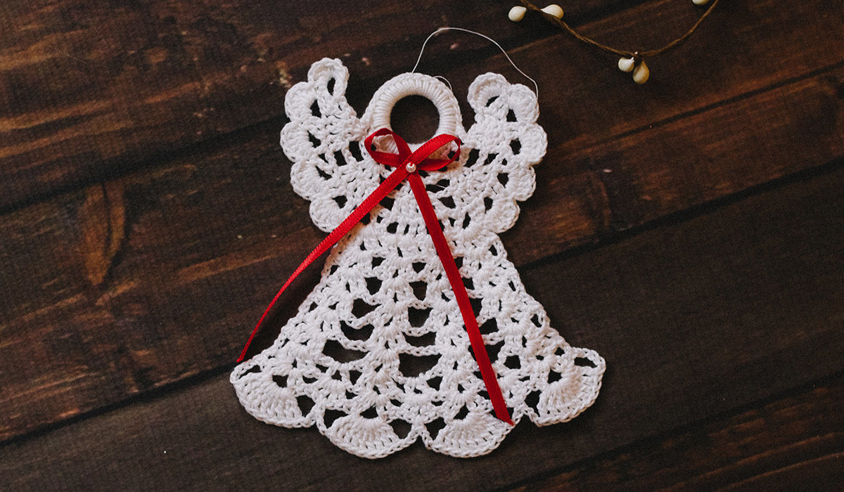 a crocheted angel ornament