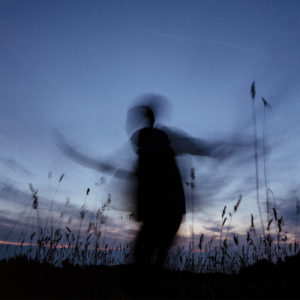 a blurred silhouette of a person